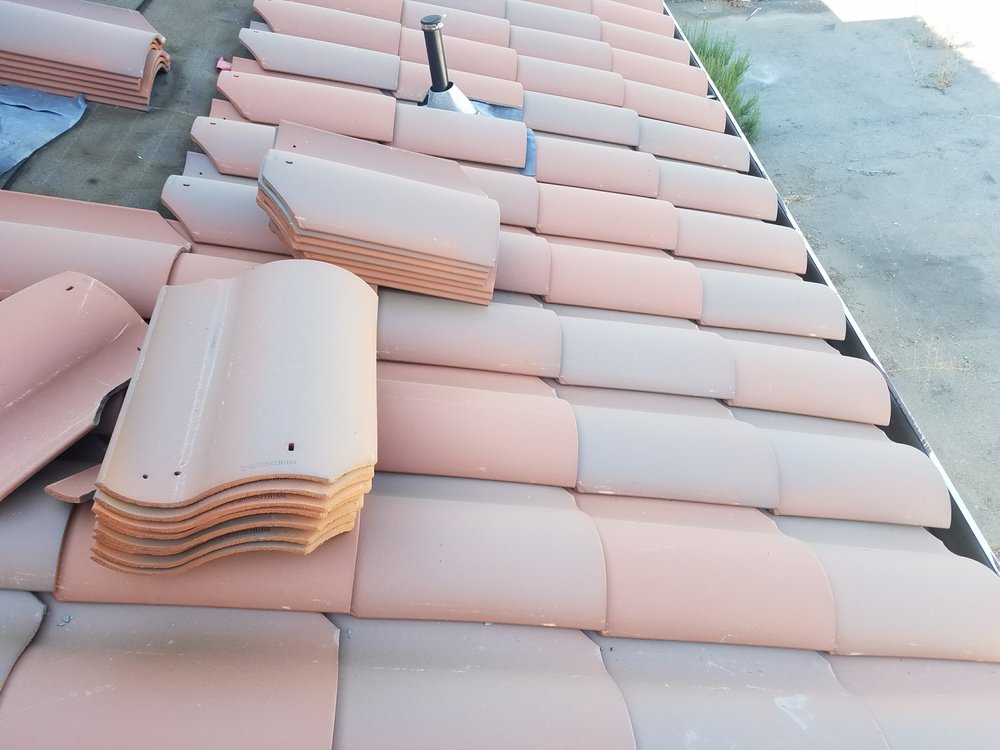 Slide of Buck's Roofing