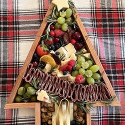 Grazeful Gatherings - A Christmas tree themed charcuterie board.