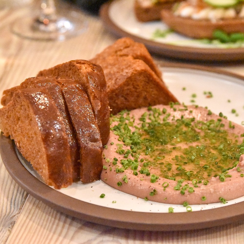 Sommelier Factory - a plate of food on a table - Wine Bars Near Me - Toronto, Ontario Sommelier Factory - a plate of food on a table - Wine Bars Near Me - Toronto, Ontario