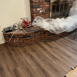 Flooring Kings - Fit flooring under fireplace, no end strip