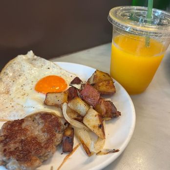 Breakfast by Salt’s Cure - Eggs, potato and breakfast patty, orange juice - Breakfast & Brunch Near Me - West Hollywood, California