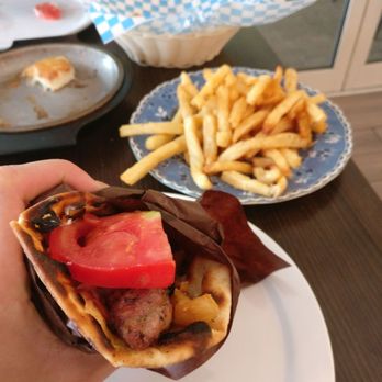 Main St Greek - Pork souvlaki pita. Juicy pork! - Greek Near Me - Markham, Ontario Main St Greek - Pork souvlaki pita. Juicy pork! - Greek Near Me - Markham, Ontario