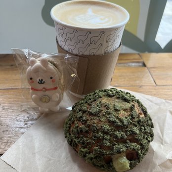 Bibble & Sip - Matcha cream puff, macaron, and a lavender latte - Coffee & Tea Near Me - New York, New York Bibble & Sip - Matcha cream puff, macaron, and a lavender latte - Coffee & Tea Near Me - New York, New York