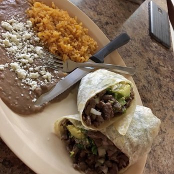 El Rinconcito DF - Carne asada burrito plate with rice and beans. They were really good. I would just add extra veggies - Mexican Near Me - Phoenix, Arizona