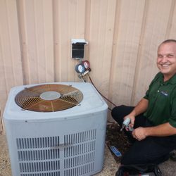 Atlantic Shores Heating and Cooling - Technican smiles for the camera