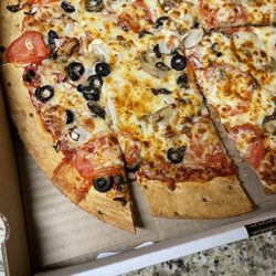 Marco's Pizza - Unfortunate that a company has to rip off their customers like this. This l should be a large pizza with paid for extra toppings.