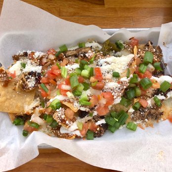 Churchkey - Personal size Borracho Nachos. Pulled pork, tomatillo chipotle sauce, pico de Gallo, green onion, cotija cheese. Delicious! - Bars Near Me - Modesto, California Churchkey - Personal size Borracho Nachos. Pulled pork, tomatillo chipotle sauce, pico de Gallo, green onion, cotija cheese. Delicious! - Bars Near Me - Modesto, California