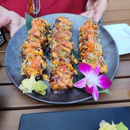 This is the T-Rex Roll on the right and left, the Godzilla roll is in the middle. This is the T-Rex Roll on the right and left, the Godzilla roll is in the middle.