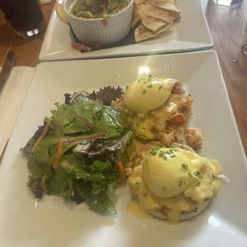 Oriole 9 - Lobster Benedict with side salad (also pictured chips & guac!) - Breakfast & Brunch Near Me - Woodstock, New York Oriole 9 - Lobster Benedict with side salad (also pictured chips & guac!) - Breakfast & Brunch Near Me - Woodstock, New York