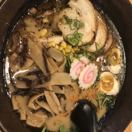 Black tonkatsu ramen with garlic oil and add fungus and bamboo shoot