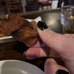 Keltic Rock Pub & Restaurant - Owner said she cooked them according to the box directions. Claims they aren't burnt. Made me pay for meal before I got it