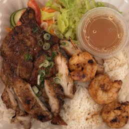 House special combination rice plate with pork chicken and shrimp (to go). House special combination rice plate with pork chicken and shrimp (to go).