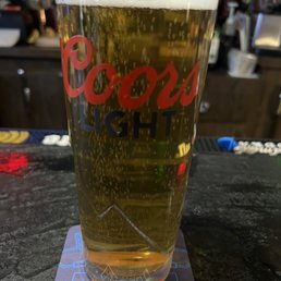 Molson Canadian in a Coors Light glass.