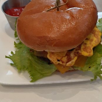 The Ringling Grillroom - Big burger with sweet potato fries - American Near Me - Sarasota, Florida The Ringling Grillroom - Big burger with sweet potato fries - American Near Me - Sarasota, Florida