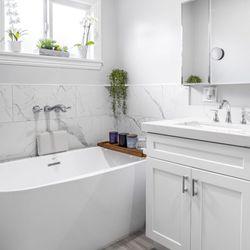 Reystone Construction - Full bathroom renovation -- soaking tub, porcelain tile, custom vanity.