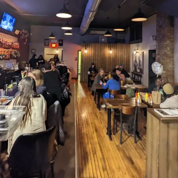The Vanguard - a crowded restaurant with people sitting at tables - Bars Near Me - Milwaukee, Wisconsin The Vanguard - a crowded restaurant with people sitting at tables - Bars Near Me - Milwaukee, Wisconsin