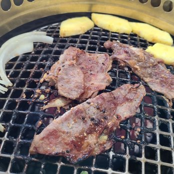 Umami Japanese Barbeque - Grilling some delicious onion, various meats, and pineapple! - Japanese Near Me - Vineyard, Utah