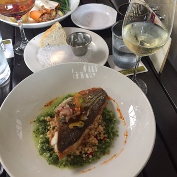 Backstreet Cafe - Houston Restaurant Weeks Main dish: seafood Bass over Cush Cush and broccoli paired with another delicious white wine. - New American Near Me - Houston, Texas