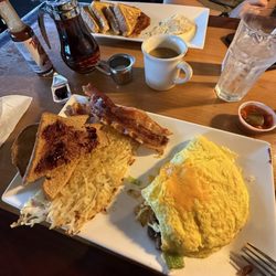Nikki's Restaurant & Lounge - Spanish omelette and French Toast with eggs and bacon.