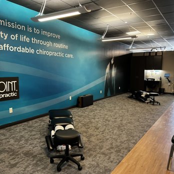 The Joint Chiropractic - Mural wall in open adjusting bay - Chiropractors Near Me - Wall Township, New Jersey The Joint Chiropractic - Mural wall in open adjusting bay - Chiropractors Near Me - Wall Township, New Jersey