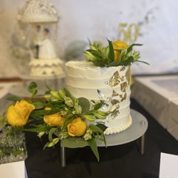 Happy Heart Bakery - 6" French vanilla cake with strawberry curd and gold leaf accent.