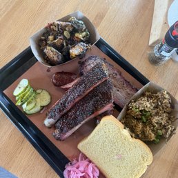 3 meat plate: Ribs, Texas Red Sausage, Brisket, Brisket Dirty Rice, Brussels 3 meat plate: Ribs, Texas Red Sausage, Brisket, Brisket Dirty Rice, Brussels