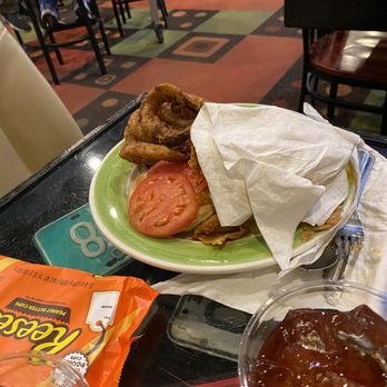 Derailed Diner - The is my wife plate the buffalo chicken sandwich with onion rings!! They were over cooked and went it arrived it's was cold!!! - Diners Near Me - Robertsdale, Alabama