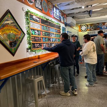 Plan B Taphouse - a group of people at a bar - Beer Gardens Near Me - Hanford, California
