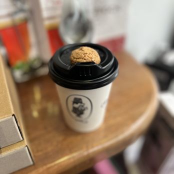 Quists Coffee - Small drink with almond cookie on top - Coffee & Tea Near Me - Melbourne, VIC Quists Coffee - Small drink with almond cookie on top - Coffee & Tea Near Me - Melbourne, VIC