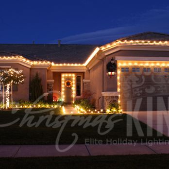 The Christmas Kings - One story home with path lighting and tree wrapped with minis. - Holiday Decorating Services Near Me - Dallas, Texas The Christmas Kings - One story home with path lighting and tree wrapped with minis. - Holiday Decorating Services Near Me - Dallas, Texas