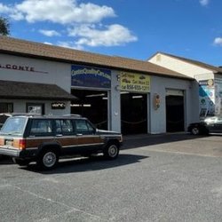 S.A. Conte - Repair Bays and cars parked ready for repair