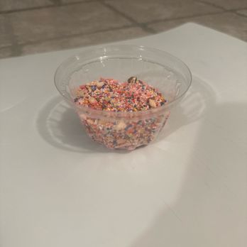 Yogurt Mill - Lid full of cookie sprinkles and walnuts. - Ice Cream & Frozen Yogurt Near Me - Modesto, California