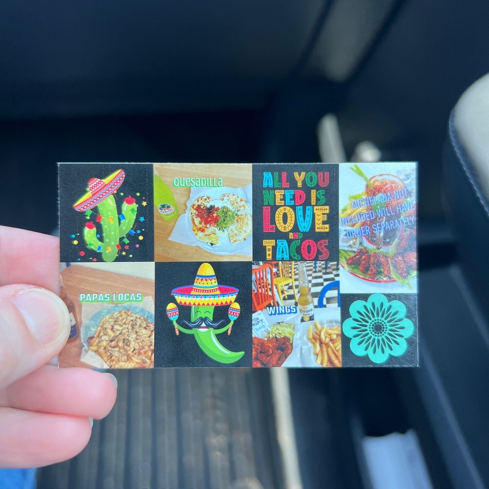 San Antonio’s Tacos - a hand holding a sticker - Tacos Near Me - Ellisville, Mississippi