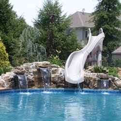 LBI Pools & Spas - Custom slide / natural stone waterfall