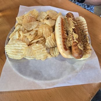 Locust Cider Market Place - Field Roast Sausage and chips. - Cideries Near Me - Seattle, Washington