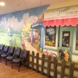David Donald, DDS PA - Our kid friendly décor has an old town mural to match our Club House.