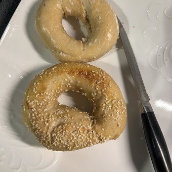 Alex's Bagel Shop - Normally they are on par. This bagel on top was like half the size. I don't even know how the two salt bagels we got today were sellable. - Bagels Near Me - Longmeadow, Massachusetts
