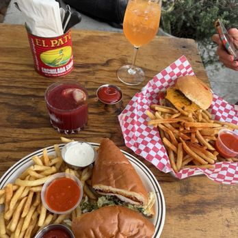 AhbA - Fried chicken sammie Sour cherry gin slushie  Instagram: @hungrytamale - Breakfast & Brunch Near Me - Laguna Beach, California
