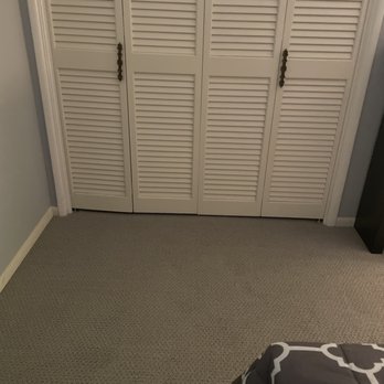 Elegant Carpet and Flooring - This is a picture of carpet installed in 2nd bedroom and closet doors that were rehung. - Carpet Installation Near Me
