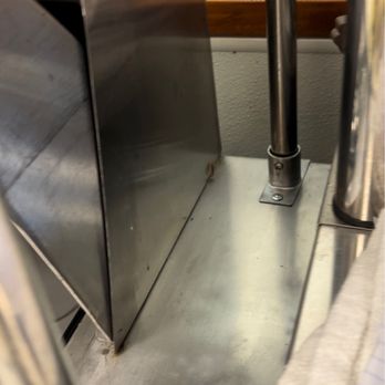 Mariscos Yandicris - a stainless steel door with a metal handle - Seafood Near Me - Downey, California
