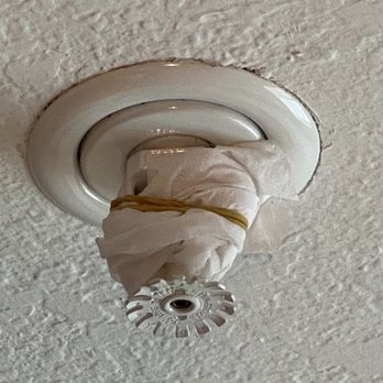 Clackamas Inn - Custom modified sprinkler with rubber band and kleenex, I'm sure that works fine. Safety first! - Hotels Near Me - Clackamas, Oregon