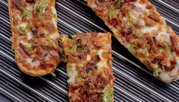 Photo of Colino's Cafe & Bakery - St Louis, MO, US. Pizza Bread with Fresh Baked Bread