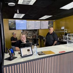 Big AL’s Cheesesteaks - Counter and owner in the back.