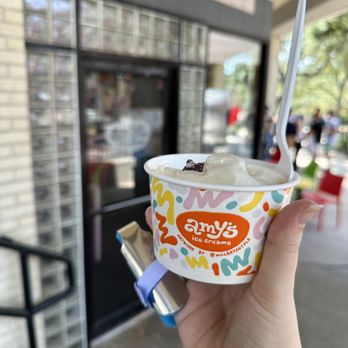 Amy's Ice Creams - a hand holding a cup of ice cream - Ice Cream & Frozen Yogurt Near Me - Austin, Texas Amy's Ice Creams - a hand holding a cup of ice cream - Ice Cream & Frozen Yogurt Near Me - Austin, Texas