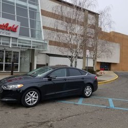Massapequa Taxi and Airport Service - Yellow cab in Massapequa at the sunrise mall