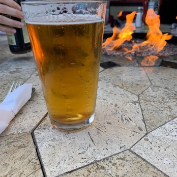 London Bridge Pub - beer at a fire table on the patio - British Near Me - Monterey, California