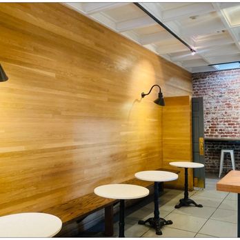 Copa Vida - Rear-back seats with exposed brick wall. - New American Near Me - Pasadena, California