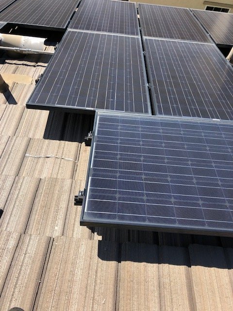 Slide of Mena Roofing