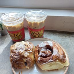 Almond chocolate croissant, cinnamon roll, 2 caramel lattes Almond chocolate croissant, cinnamon roll, 2 caramel lattes