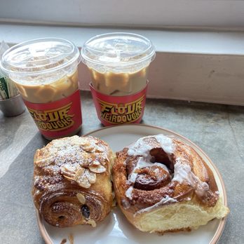Flour & Weirdoughs - Almond chocolate croissant, cinnamon roll, 2 caramel lattes - Bakeries Near Me - Key Biscayne, Florida Flour & Weirdoughs - Almond chocolate croissant, cinnamon roll, 2 caramel lattes - Bakeries Near Me - Key Biscayne, Florida